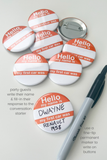Six round pinback buttons with a white and orange design reading 'Hello my name is my first car was' are arranged on a light background, with one button personalized and a black marker nearby. Text on the image explains party guest customization.