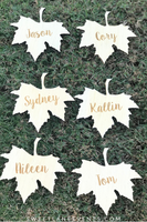 wood cut out leaves on grass