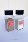 pink labeled cinnamon sugar salt popcorn seasoning jars