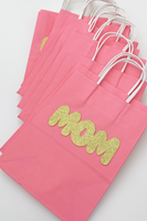 gold glitter mom goodie bags